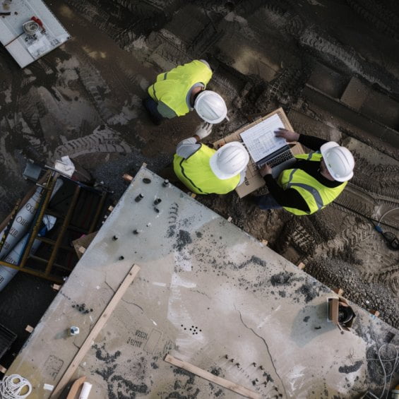 group of people at a construction site