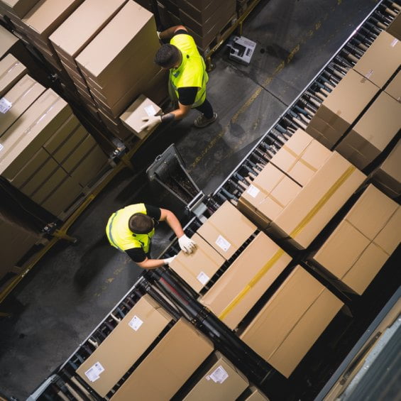 group of people working in a warehouse