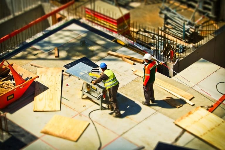 Construction workers collaborating