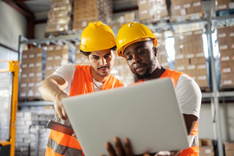 Two men in hard hats