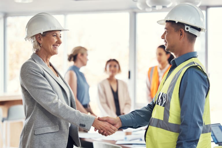 Two professionals shaking hands