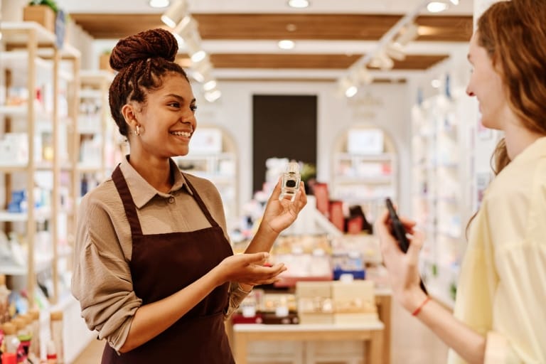 Two women conversing in a store